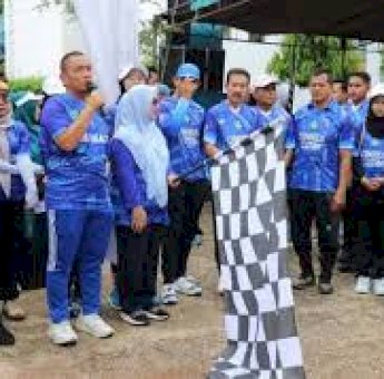 Perayaan HKN ke-61 di Lutim Meriah: Jalan Sehat, Penyerahan Penghargaan, dan Bantuan Ambulans